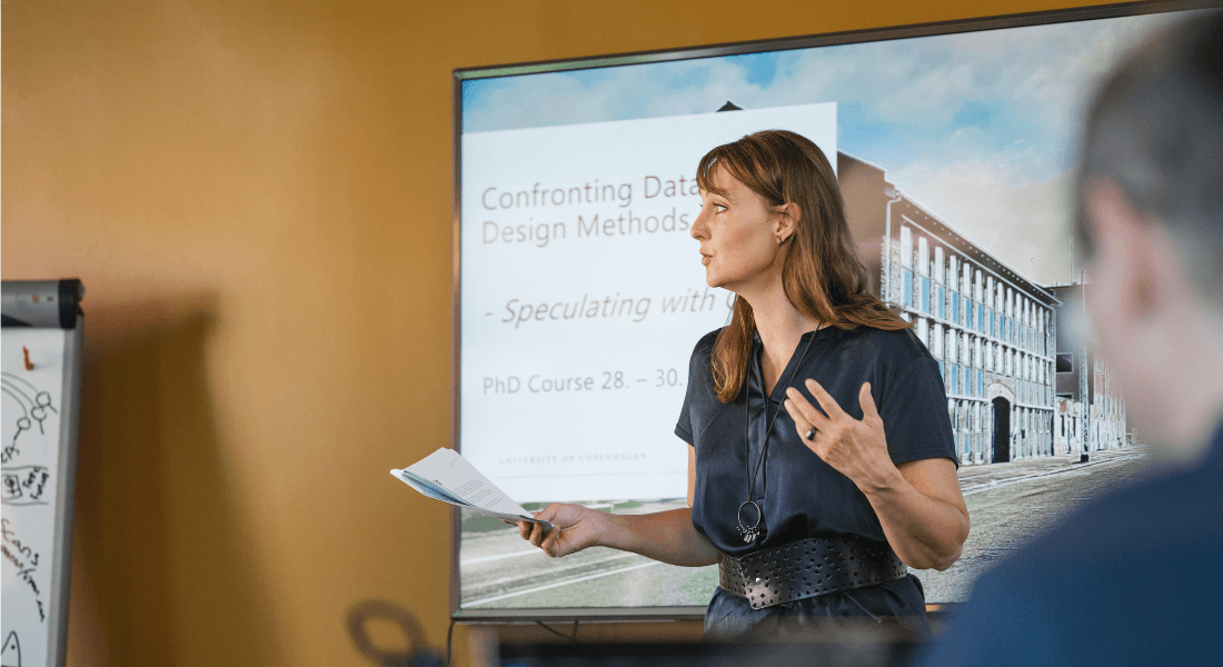 Researchers giving a talk